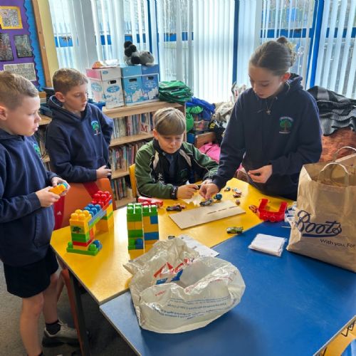 Science Week Yr7 constructing their bridges