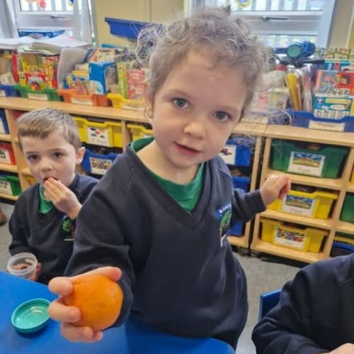 Yr1 enjoying a healthy break on TASTY TUESDAY